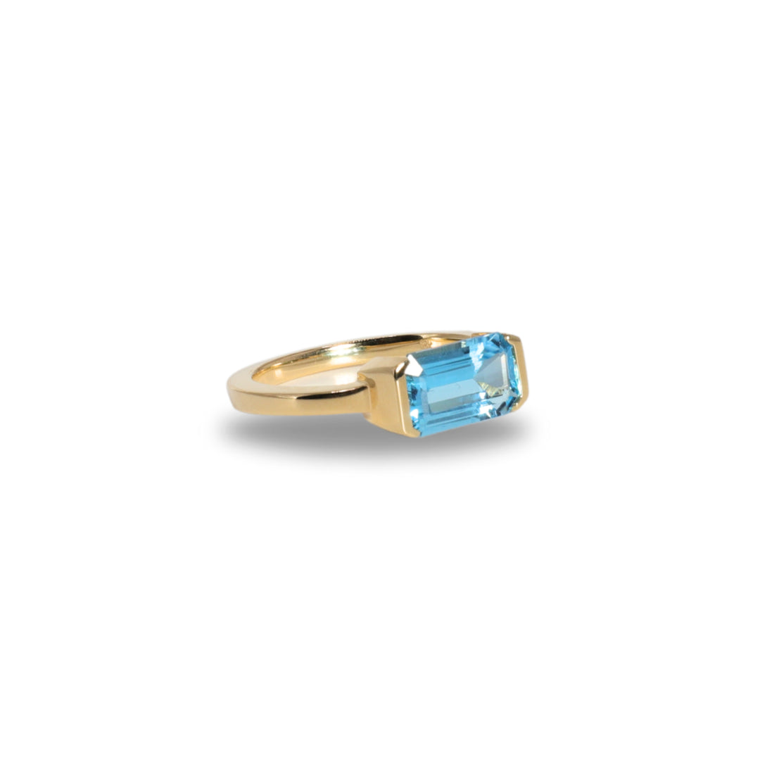 Floating Bezel Ring in Blue Topaz